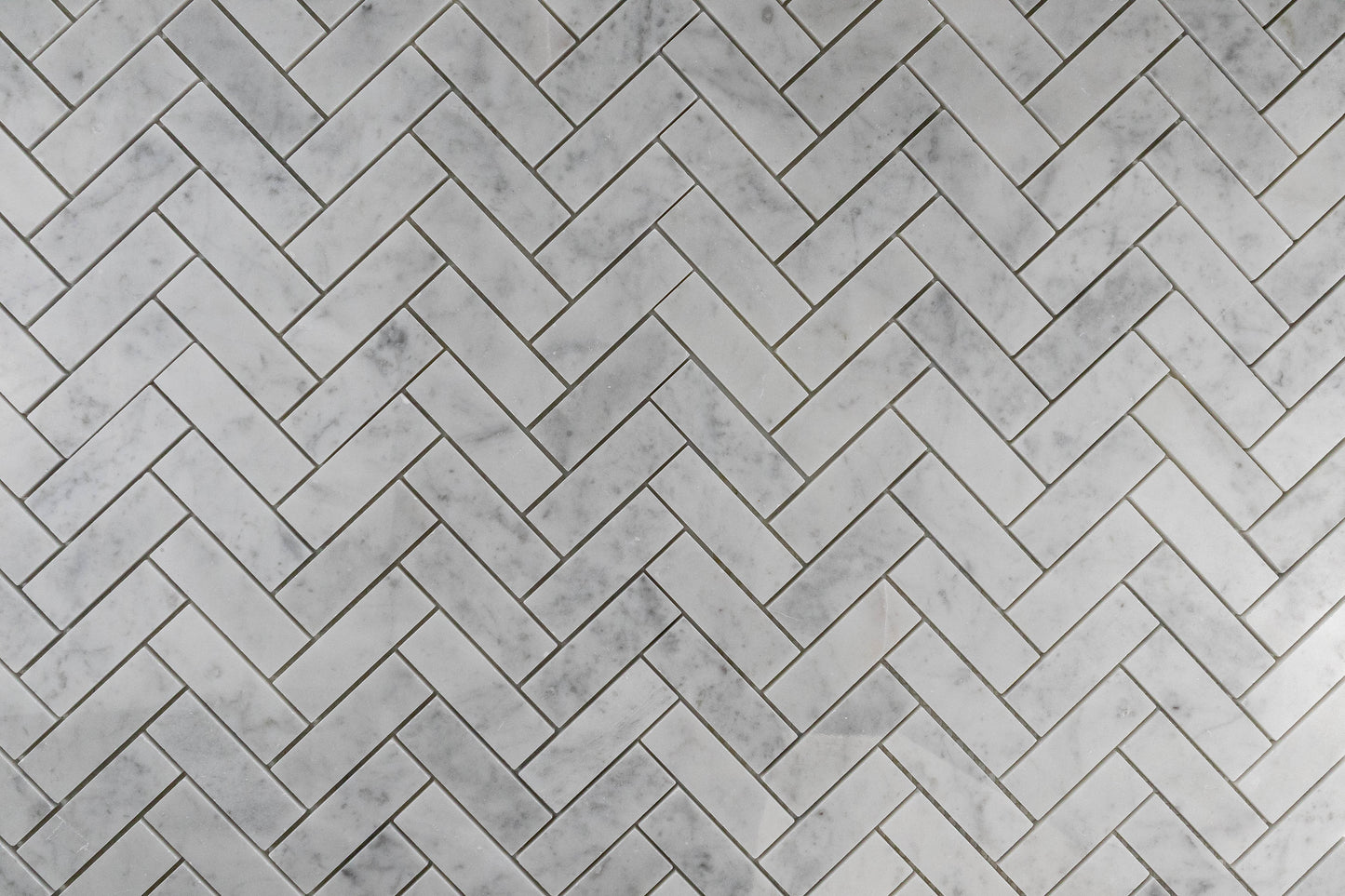 1"x3" Carrara Herringbone Polished