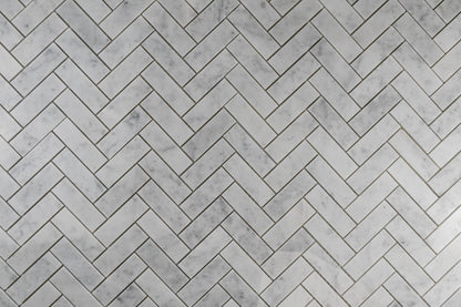 1"x3" Carrara Herringbone Polished