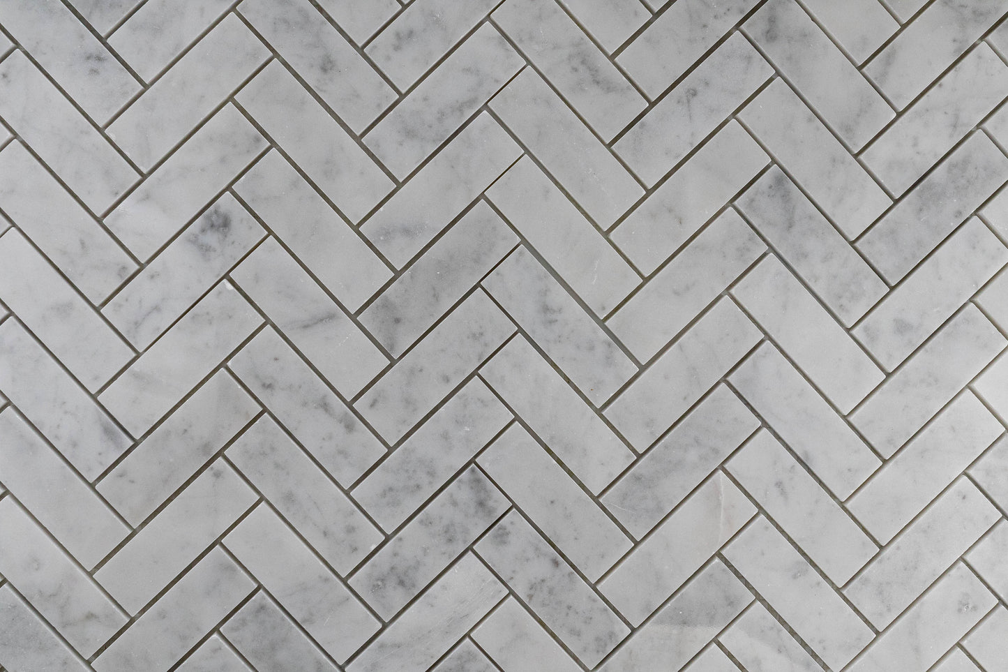 1"x3" Carrara Herringbone Polished