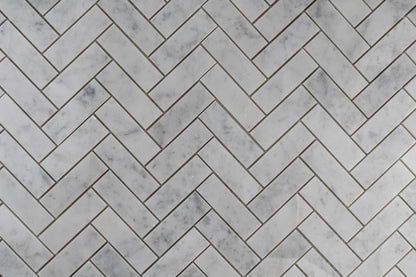 1"x3" Carrara Herringbone Polished