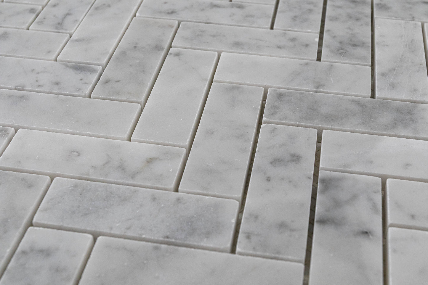 1"x3" Carrara Herringbone Polished